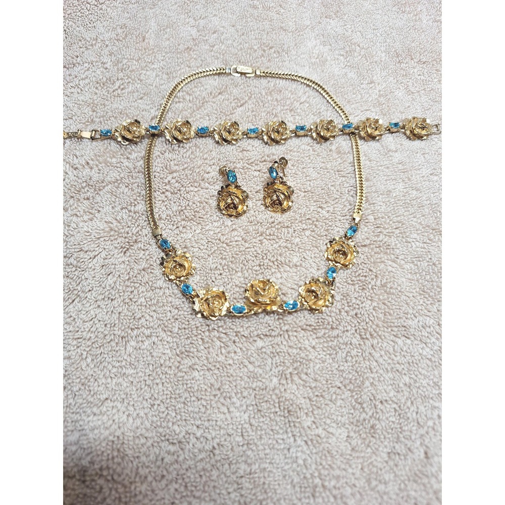 Vintage rose necklace bracelet earrings set with blue rhinestones in gold tone